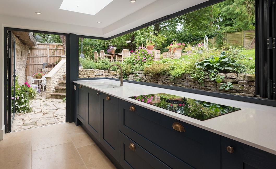 Pass-Through Bi-Fold Window