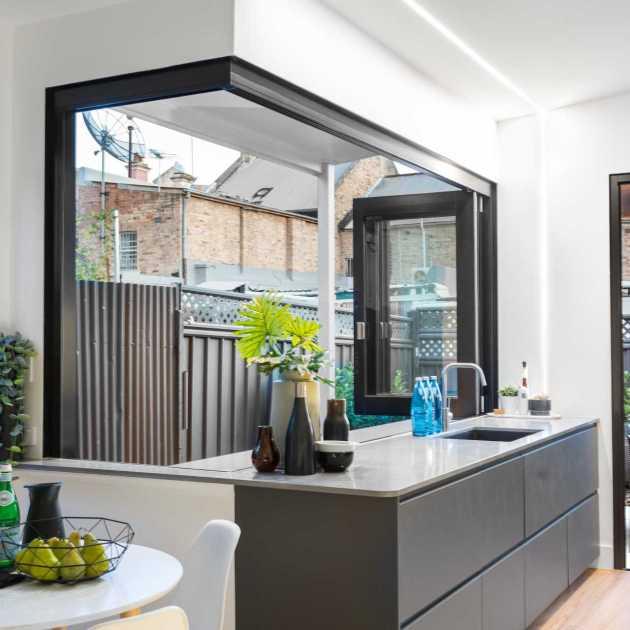 Pass-Through Bi-Fold Window